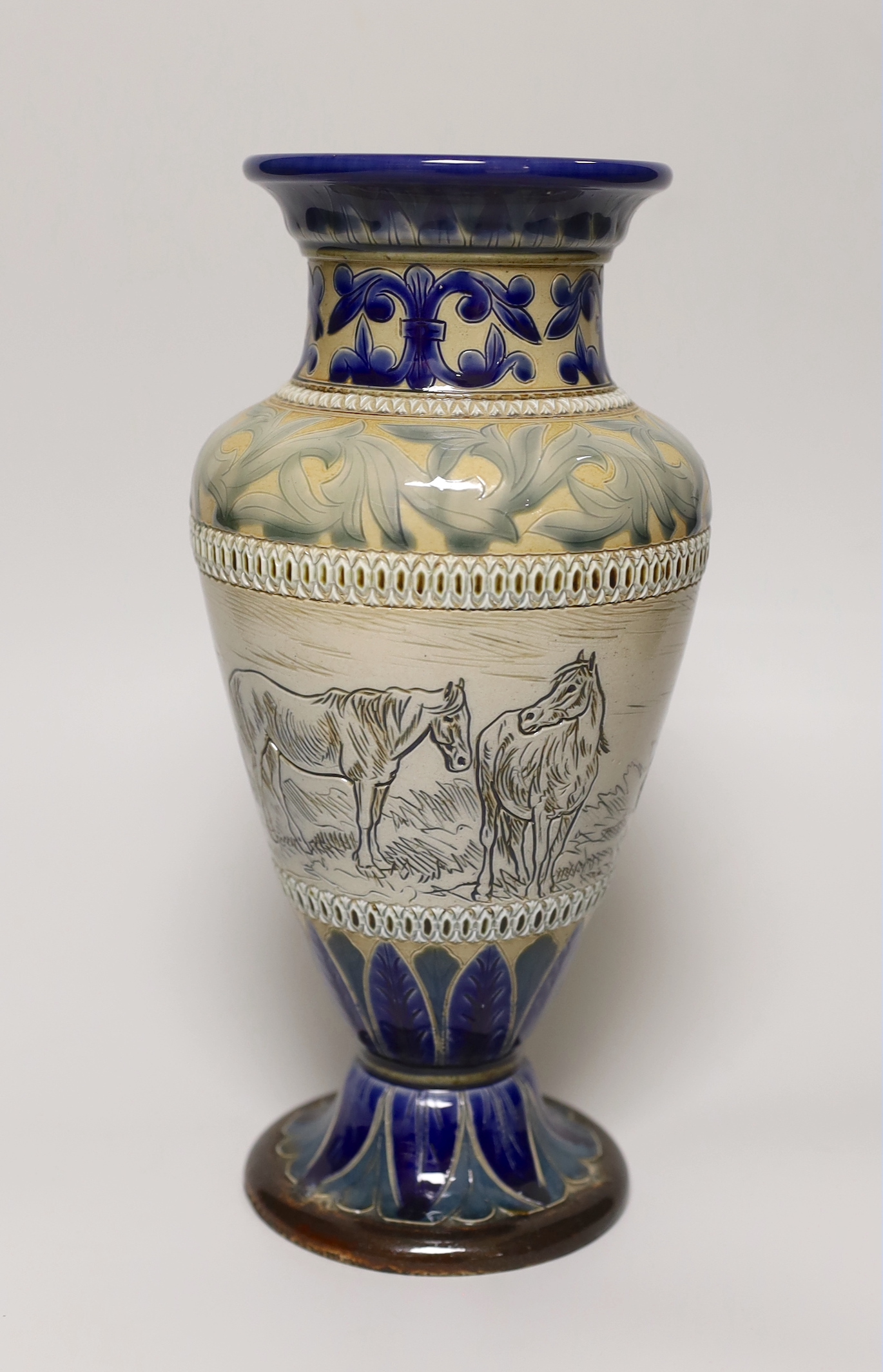 A Hannah Barlow Doulton Lambeth stoneware vase, decorated with horses, stamped and numbered 1883 to the base, 27cm high